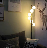 Eirik Trendy Gold and Black Floor Lamp | New Arrival